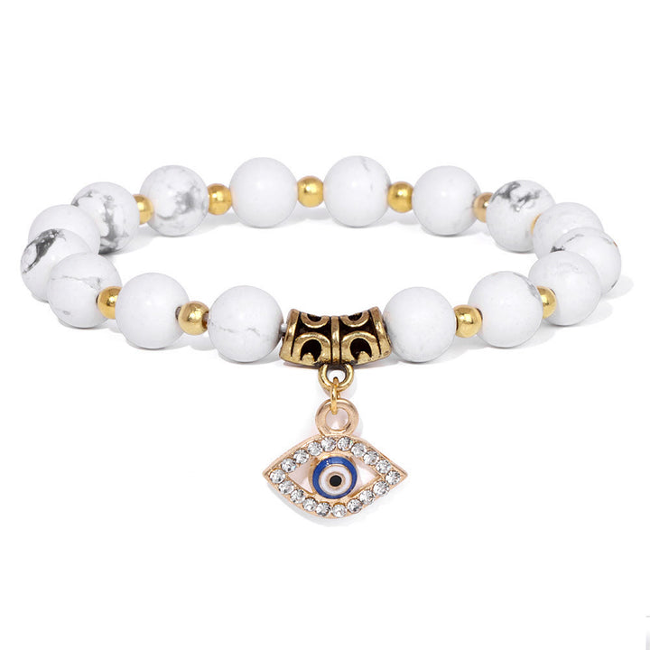 Pulsera con colgante de ojo malvado y cuentas de piedra natural de Olivenorma