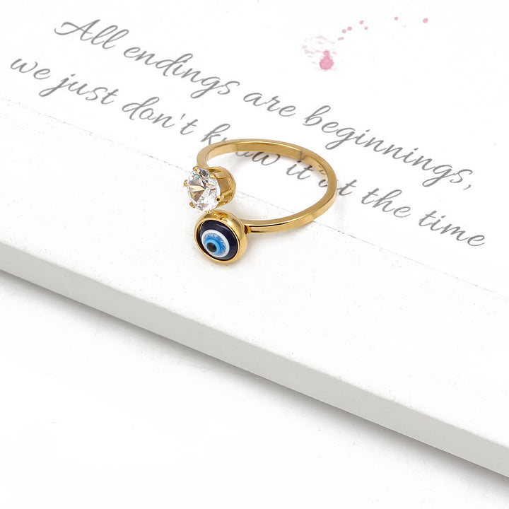Anillo de mujer con ojo malvado bañado en oro y circonita blanca de Olivenorma 