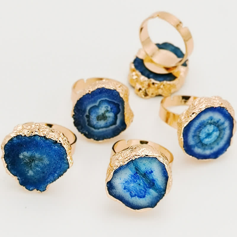 Anillo ajustable con piedras preciosas de girasol y cristal natural de Olivenorma 