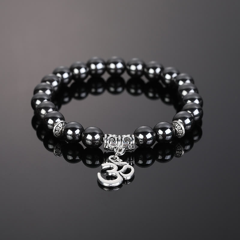 Pulsera con símbolo Om y cuentas de cristal natural de Olivenorma