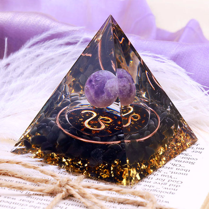 Pirámide de orgón del zodiaco Leo con esfera de amatista y obsidiana de Olivenorma 