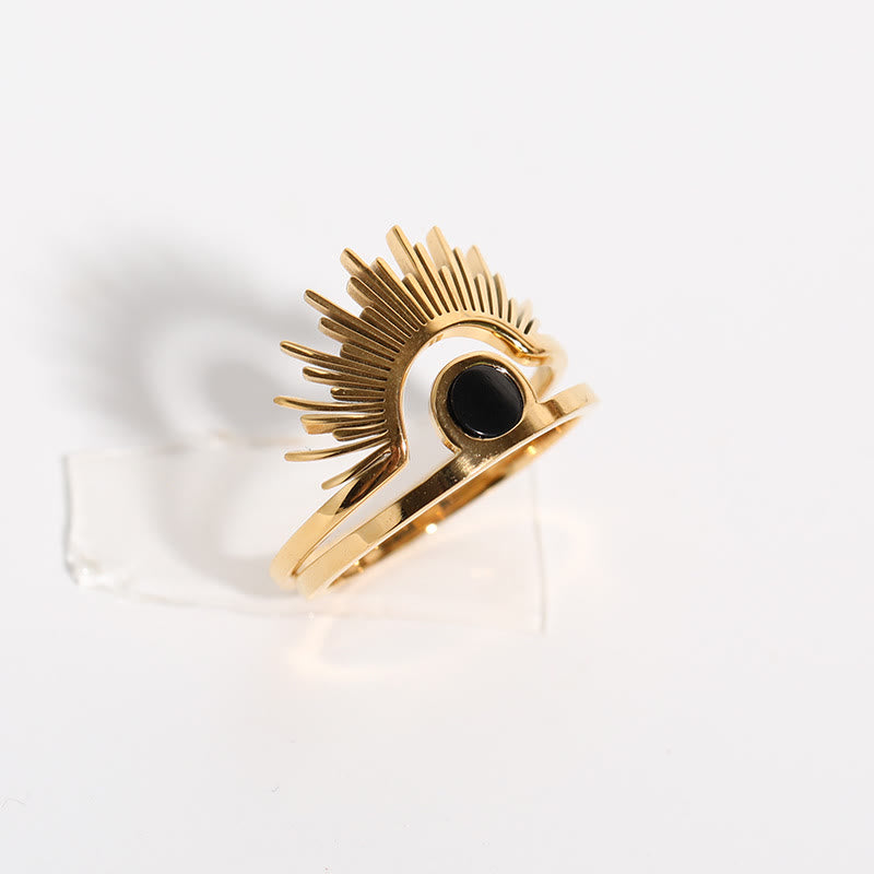 Anillo de acero inoxidable bañado en oro de 18 k con girasol y ónix negro de Olivenorma 