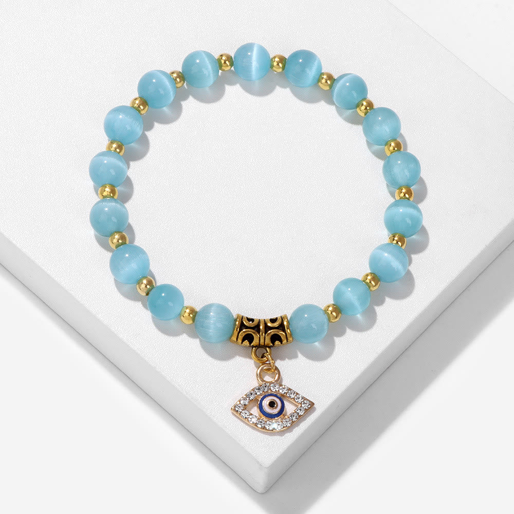 Pulsera con colgante de ojo malvado y cuentas de piedra natural de Olivenorma