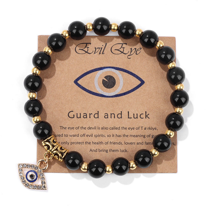 Pulsera con colgante de ojo malvado y cuentas de piedra natural de Olivenorma