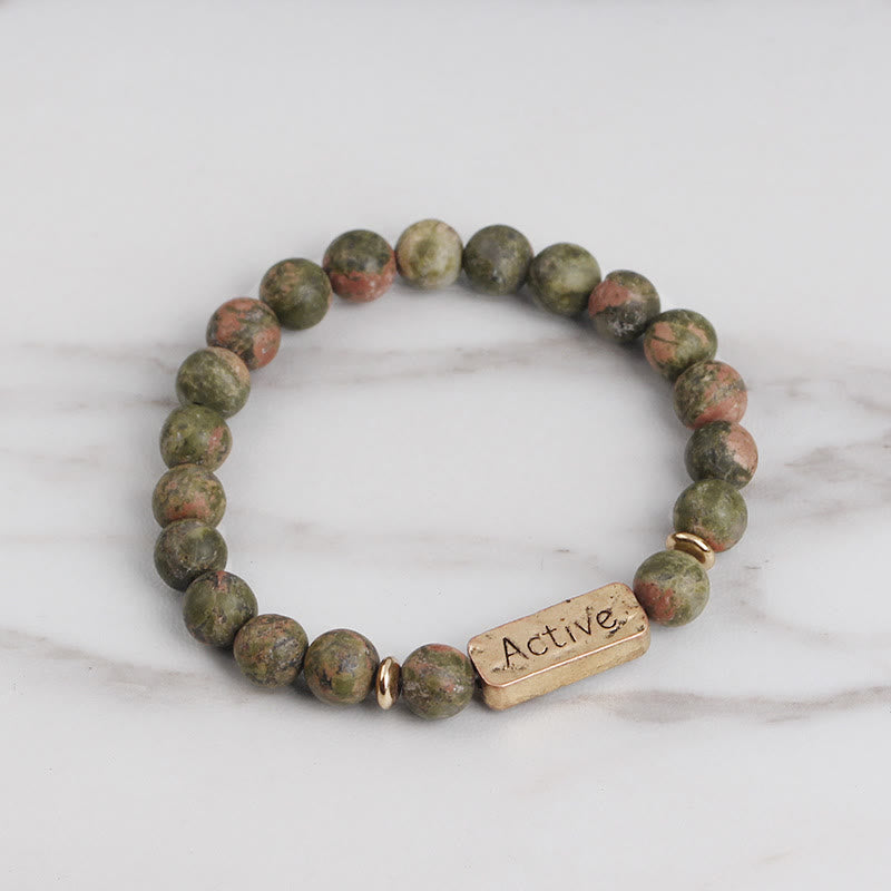 Pulsera con grabado de fe activa con piedras preciosas naturales de Olivenorma