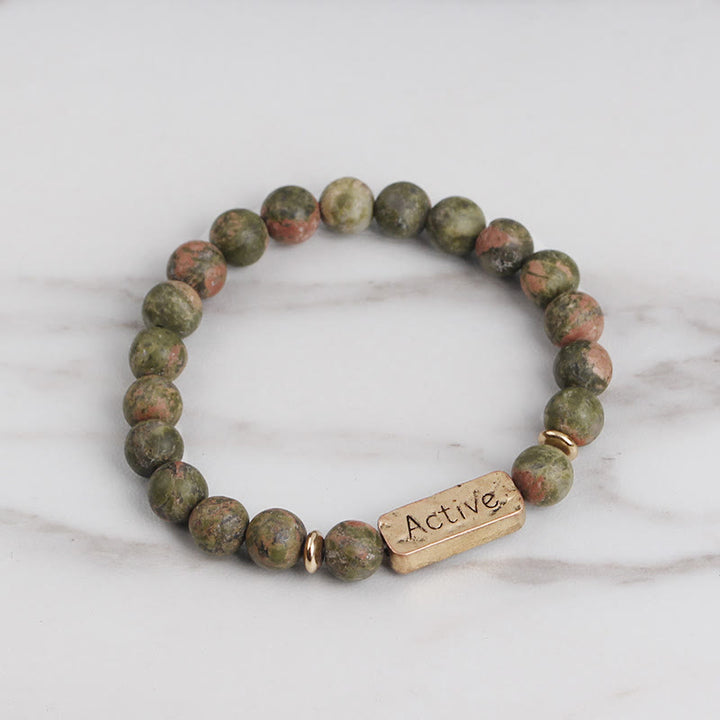 Pulsera con grabado de fe activa con piedras preciosas naturales de Olivenorma