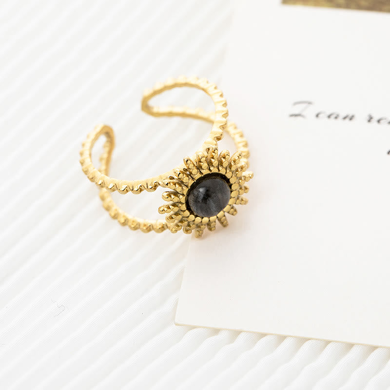 Anillo de gemas con estrella de ocho puntas y doble hilera de girasol de Olivenorma