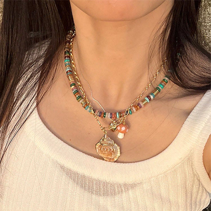 Pulsera y collar con piedras preciosas y cuentas redondas de cristal mixtas estilo bohemio de Olivenorma 