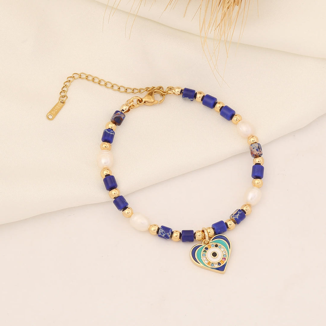 Pulsera de cobre con perlas de agua dulce y piedra natural de Olivenorma 