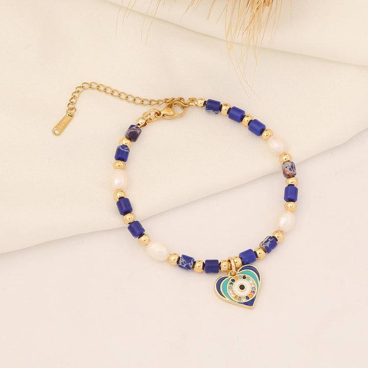 Pulsera de cobre con perlas de agua dulce y piedra natural de Olivenorma 