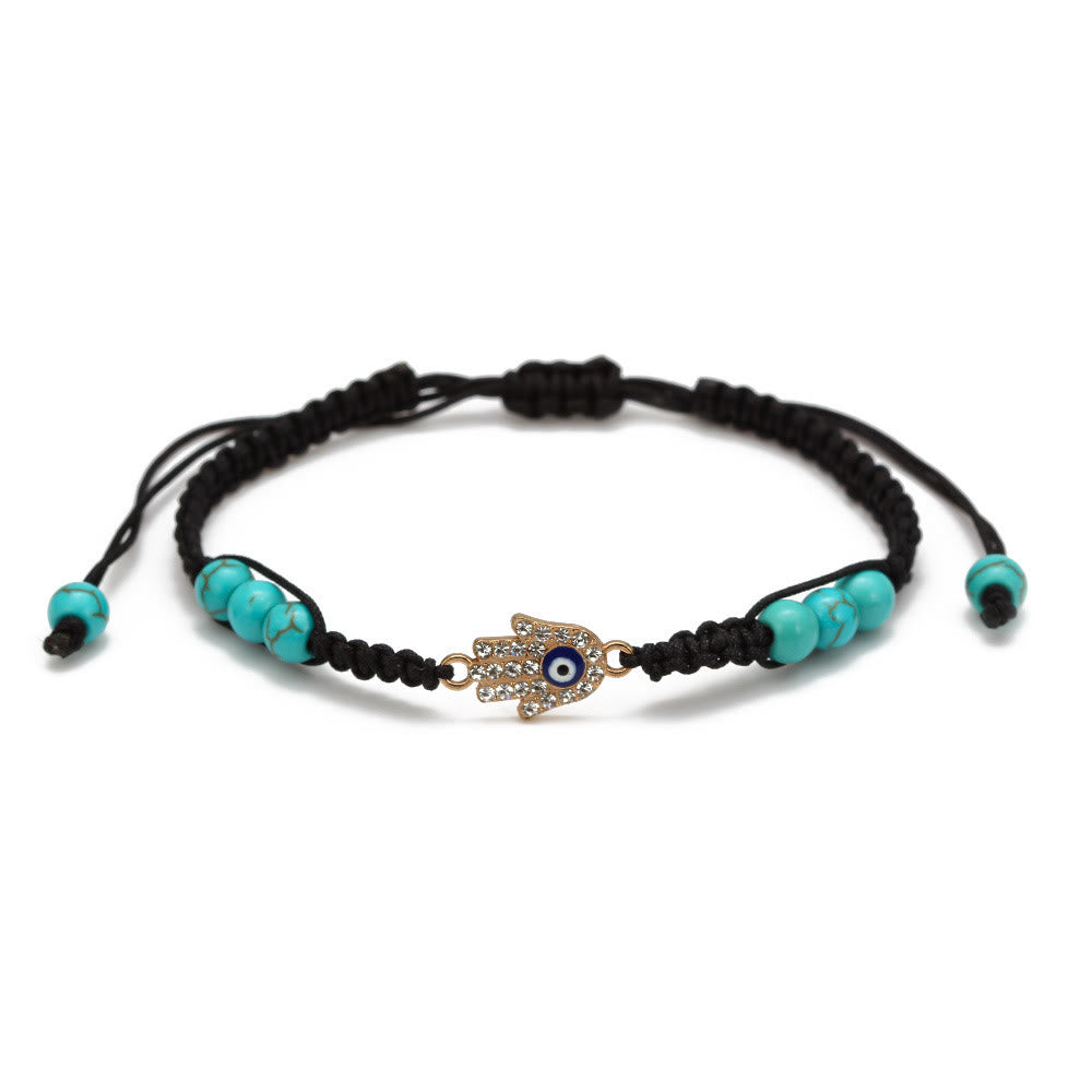 Pulsera trenzada ajustable con ojo malvado y circonita blanca y turquesa de Olivenorma 