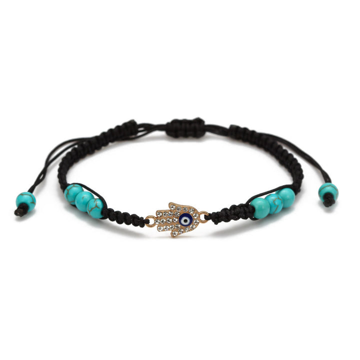 Pulsera trenzada ajustable con ojo malvado y circonita blanca y turquesa de Olivenorma 