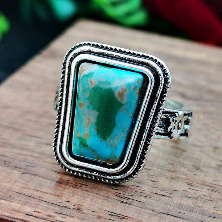 Anillo de plata con rosa en relieve bañado en piedra del emperador Olivenorma 