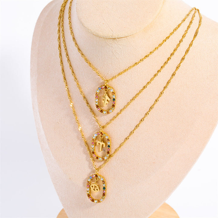 Collar con constelación del zodiaco ovalada calada con circonitas de Olivenorma 