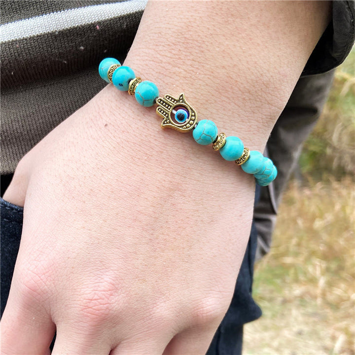 Pulsera de cuentas naturales para hombre de 8 mm con ojo malvado de Olivenorma