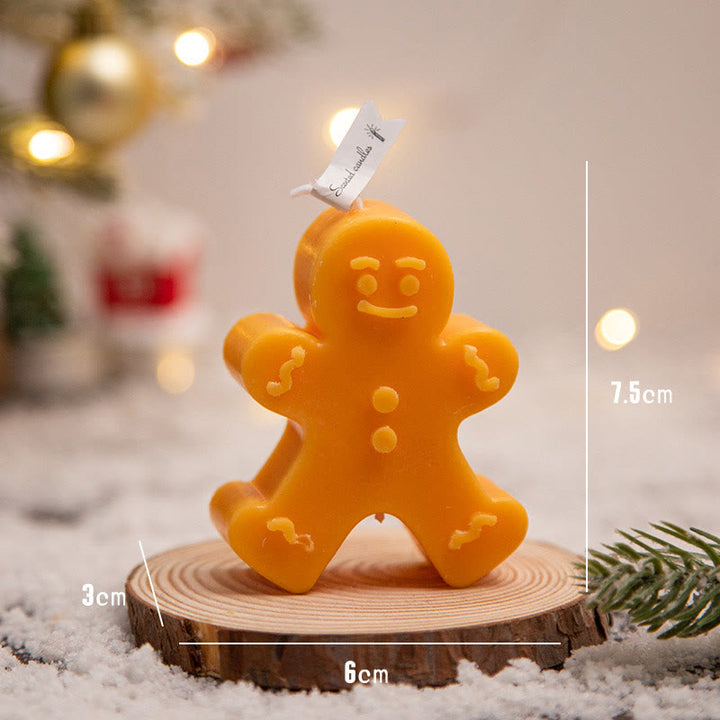 Vela perfumada con forma de hombrecito de jengibre y copos de nieve con atmósfera navideña de Olivenorma 