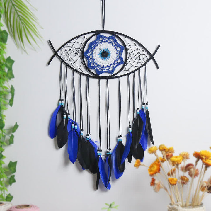 Atrapasueños de plumas de mal de ojo azul 