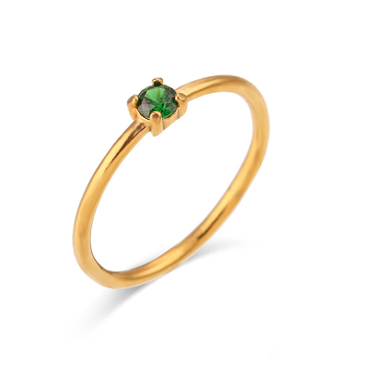 Anillo de acero inoxidable chapado en oro de 18 quilates con piedra natal simple de Olivenorma