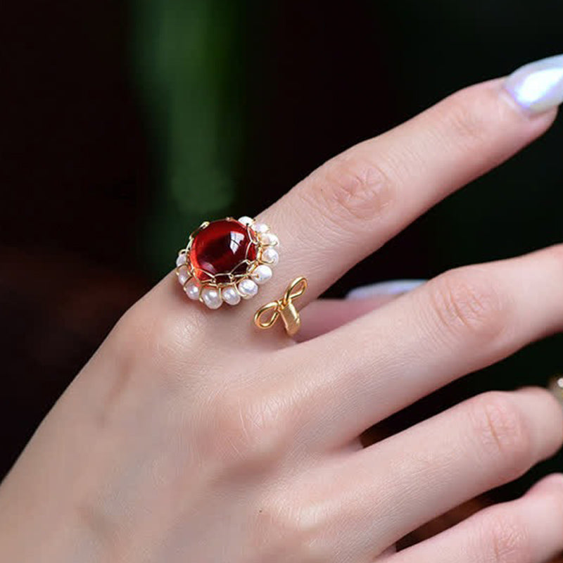 Anillo curativo de cuarzo rojo con perla