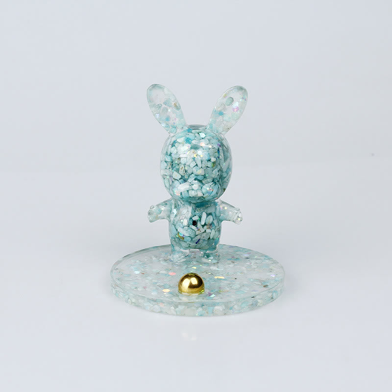 Soporte para teléfono móvil con forma de conejo de epoxi y grava de cristal natural de Olivenorma