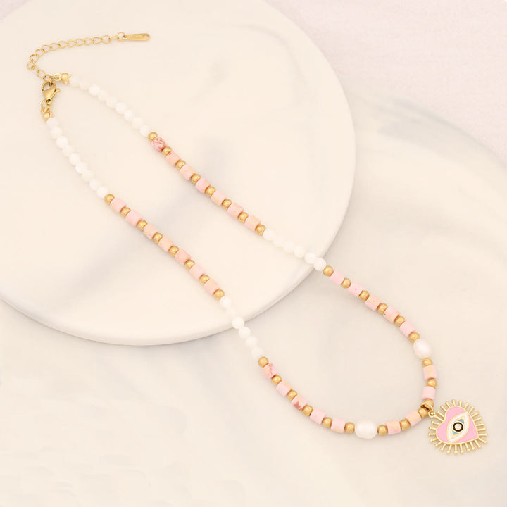 Collar con colgante de ojo malvado con piedra de cristal y perla natural de Olivenorma