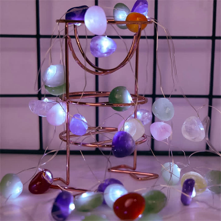 Lámpara de piedras pulidas de cristal natural de Olivenorma para decoración de ambientes navideños