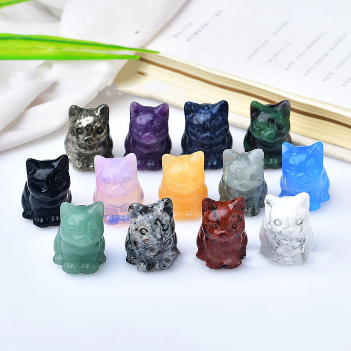 Artesanías con talladas de piedras preciosas y gatitos de cristal de Olivenorma.
