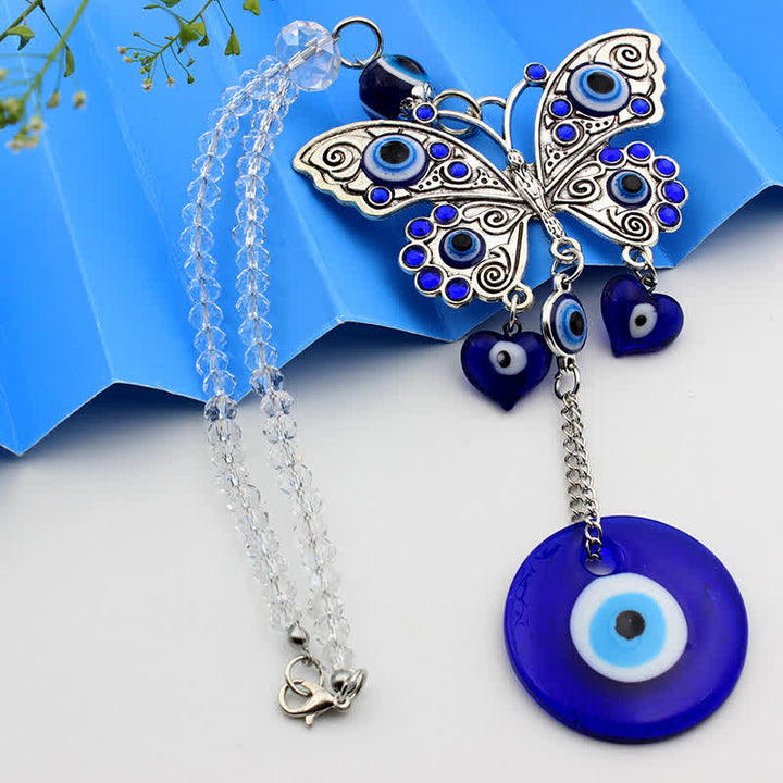 Amuleto decorativo de pared con forma de mariposa y ojo malvado de Olivenorma