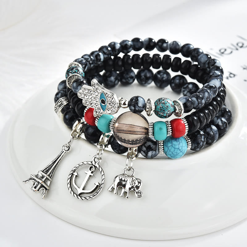 Juego de pulseras de hamsa con ojo malvado y torre de elefante de Olivenorma