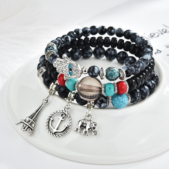 Juego de pulseras de hamsa con ojo malvado y torre de elefante de Olivenorma