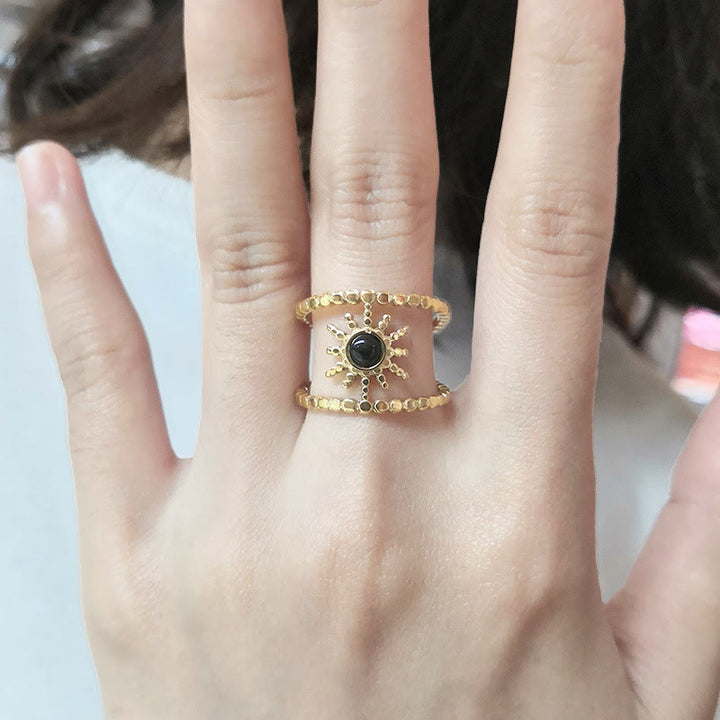 Anillo de gemas con estrella de ocho puntas y doble hilera de girasol de Olivenorma
