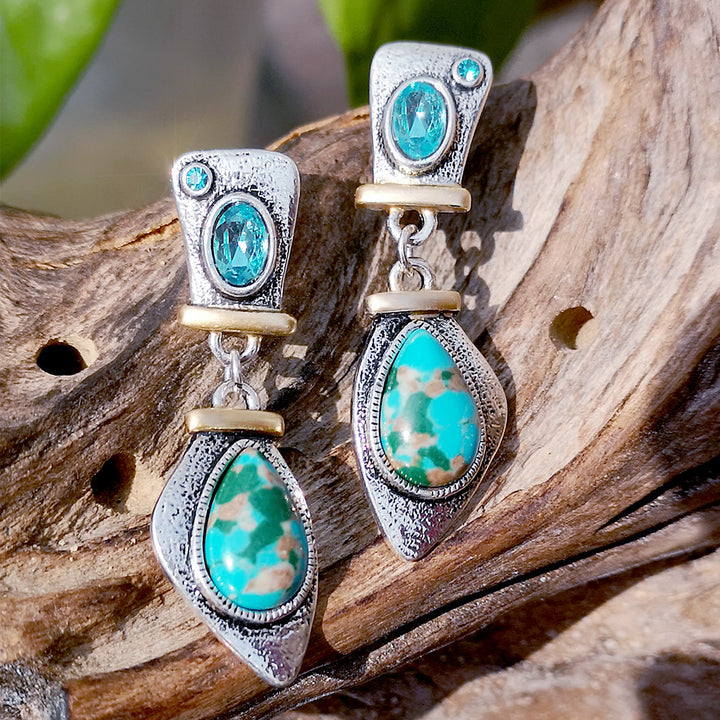 Pendientes de plata con topacio azul y piedra emperadora de Olivenorma