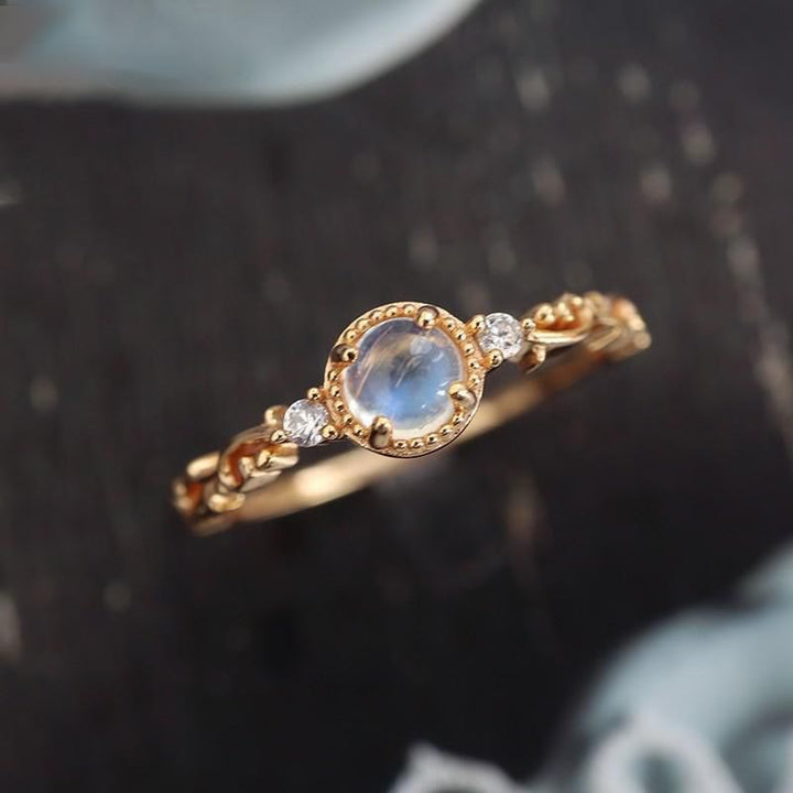 Anillo delicado de circonita y piedra lunar natural de Olivenorma
