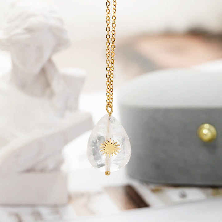 Collar con gemas curativas y gotas de agua con hexagrama