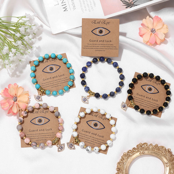 Pulsera con colgante de ojo malvado y cuentas de piedra natural de Olivenorma