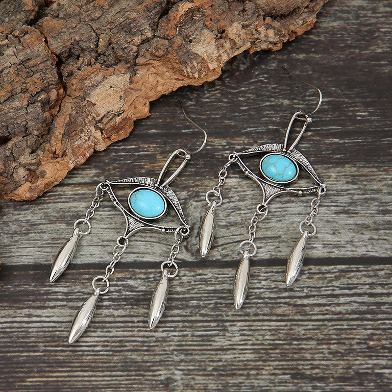 Pendientes bohemios con turquesa y ojo recortado geométrico de Olivenorma
