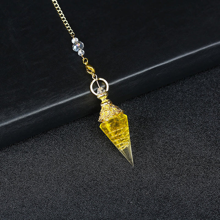 Péndulo piramidal hexagonal de resina de cristal natural de Olivenorma 