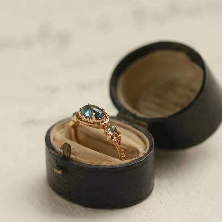 Anillo ajustable con piedra de topacio azul natural de Olivenorma