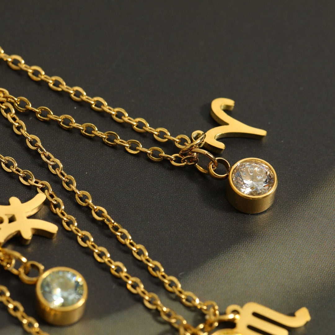 Collar de acero inoxidable con piedra natal y runa del zodíaco de Olivenorma