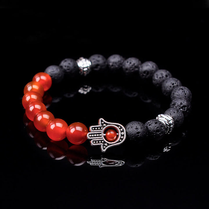 Pulsera con colgante de Hamsa y cuentas de piedra natural hecha a mano de Olivenorma