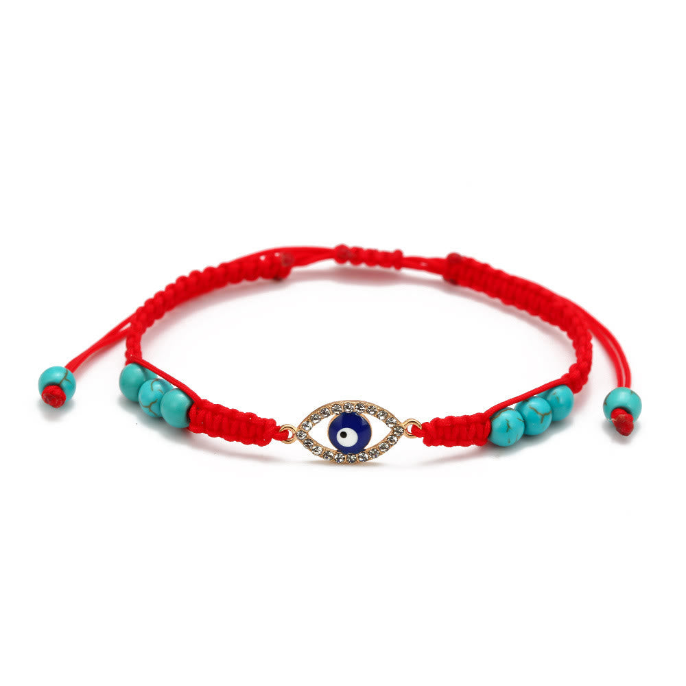 Pulsera trenzada ajustable con ojo malvado y circonita blanca y turquesa de Olivenorma 
