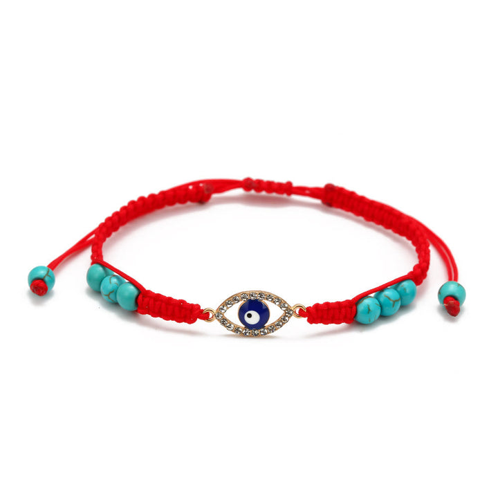 Pulsera trenzada ajustable con ojo malvado y circonita blanca y turquesa de Olivenorma 