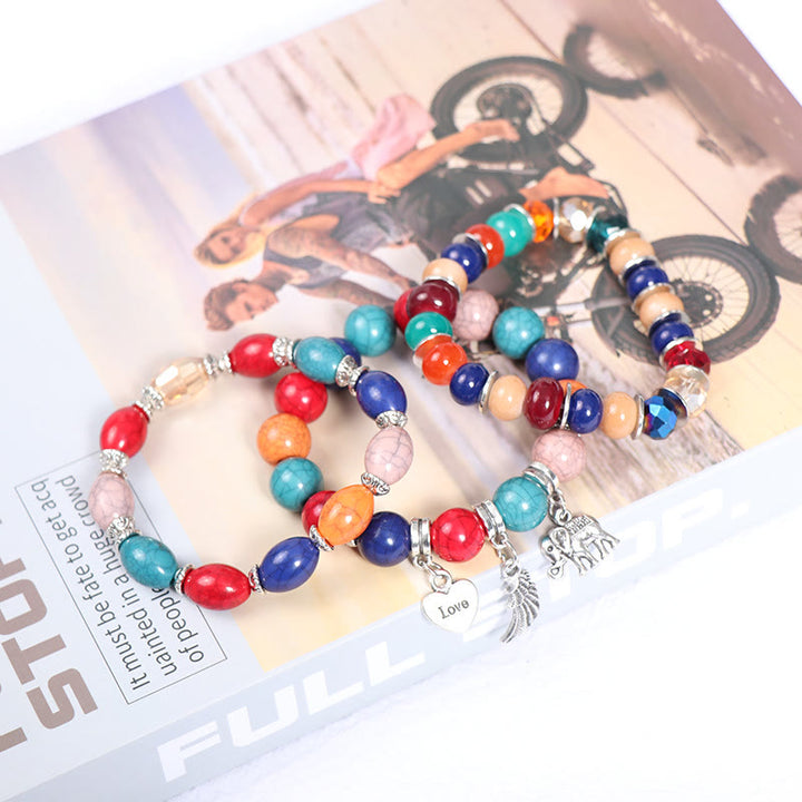 Juego de pulseras con cuentas y colgante de corazón con alas de elefante de Olivenorma 