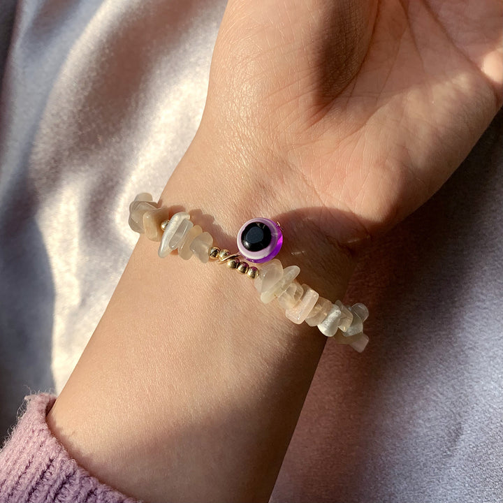 Pulsera con colgante de ojo malvado de grava de cristal natural de Olivenorma