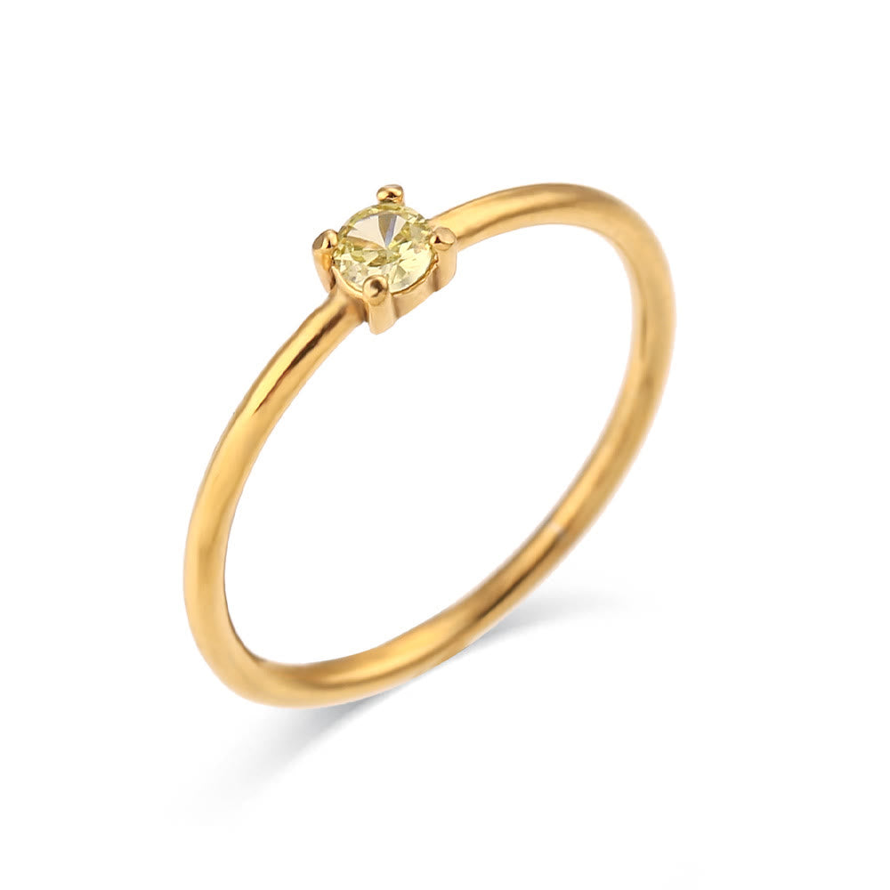Anillo de acero inoxidable chapado en oro de 18 quilates con piedra natal simple de Olivenorma