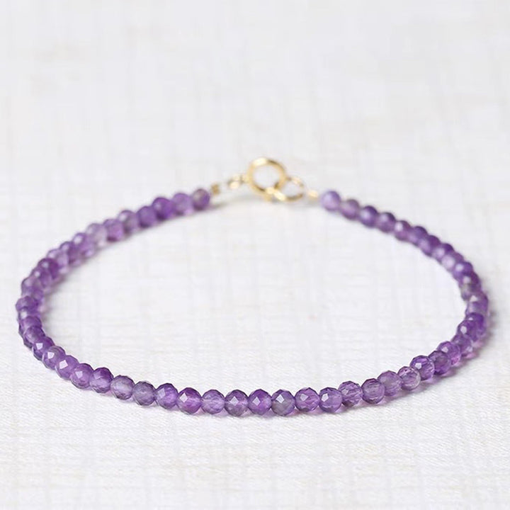 Pulsera de piedras preciosas curativas de amatista de Uruguay con puesta de sol morada de Olivenorma
