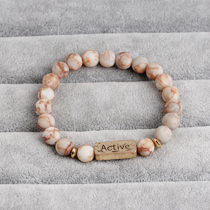 Pulsera con grabado de fe activa con piedras preciosas naturales de Olivenorma