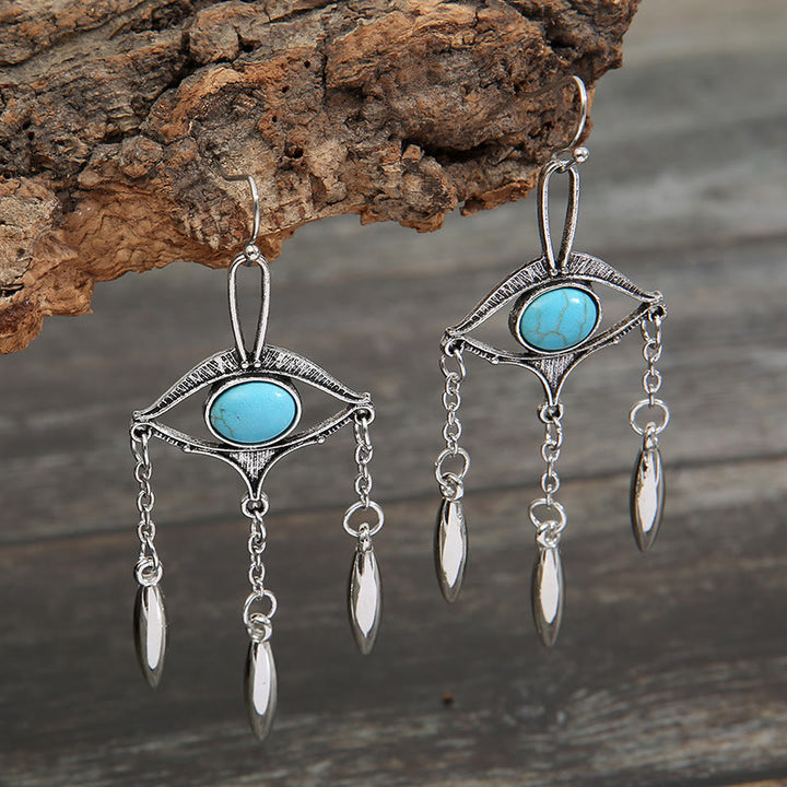 Pendientes bohemios con turquesa y ojo recortado geométrico de Olivenorma