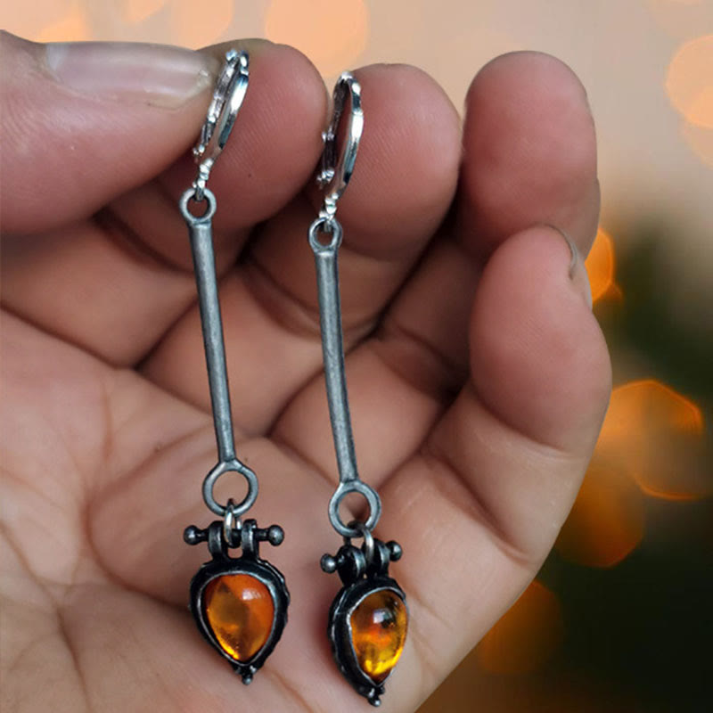 Pendientes de piedra de ámbar con forma de gota de agua de la tribu Olivenorma