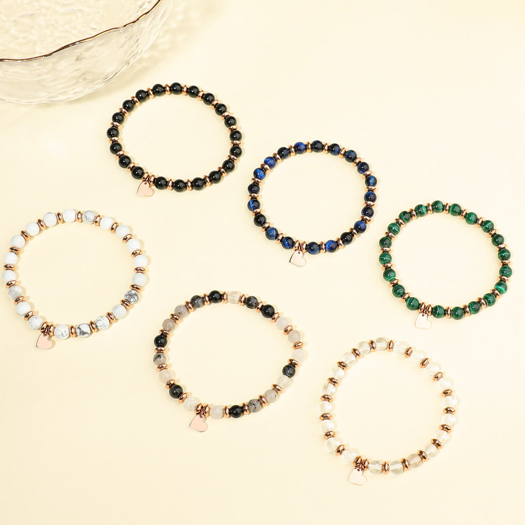 Pulsera con colgante de corazón de metal con cuentas de cristal natural de Olivenorma